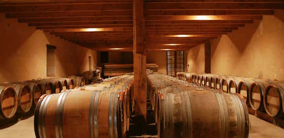 Barriques di affinamento per il vino Sauternes AOP